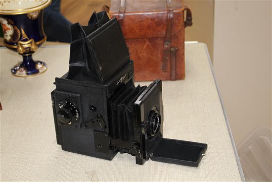 A Pickard Junior Special quarter plate camera with J H Dallmeyer lens, Anastigmat lens, height when closed 17cm, depth when closed 13cm